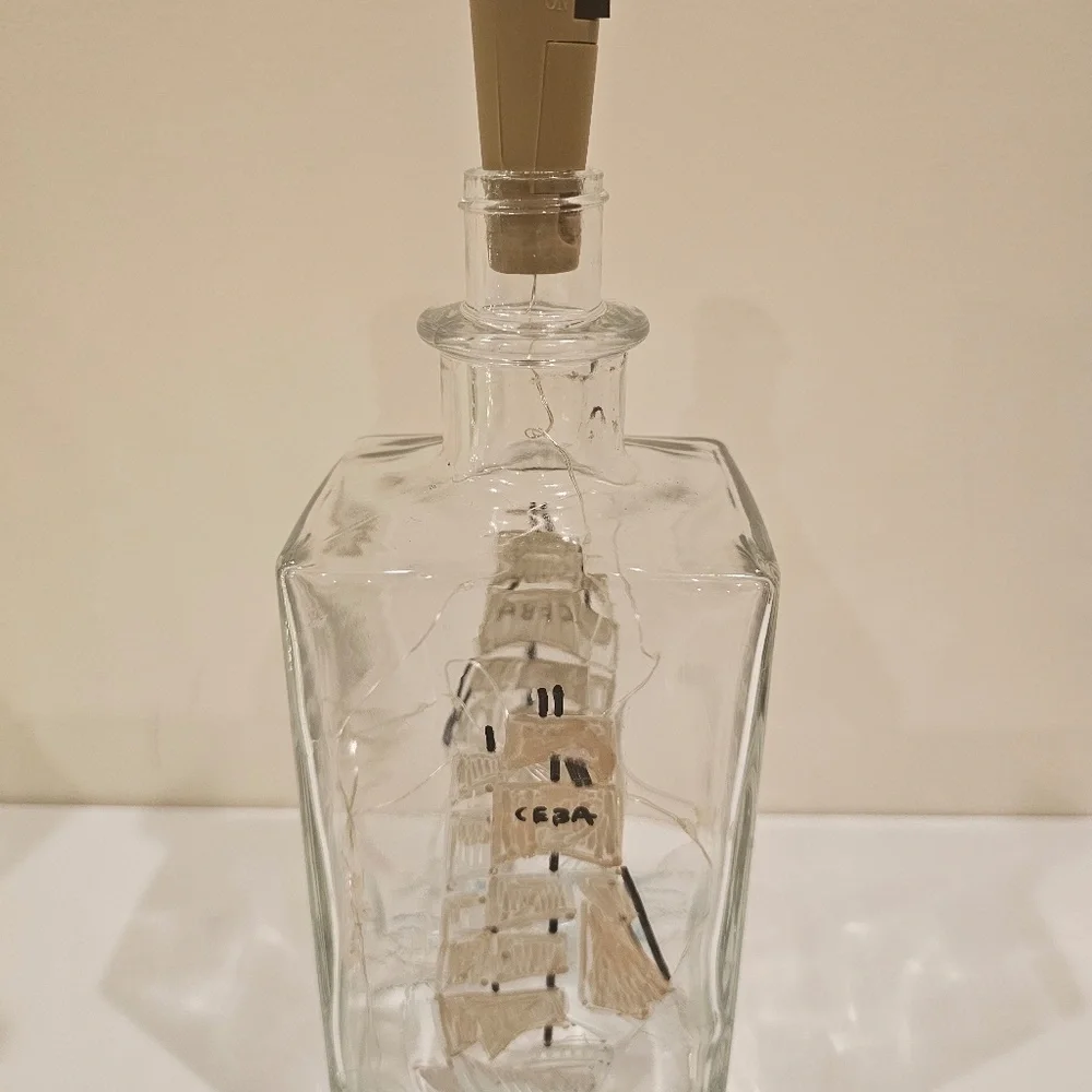 Liquor bottle with cork lights